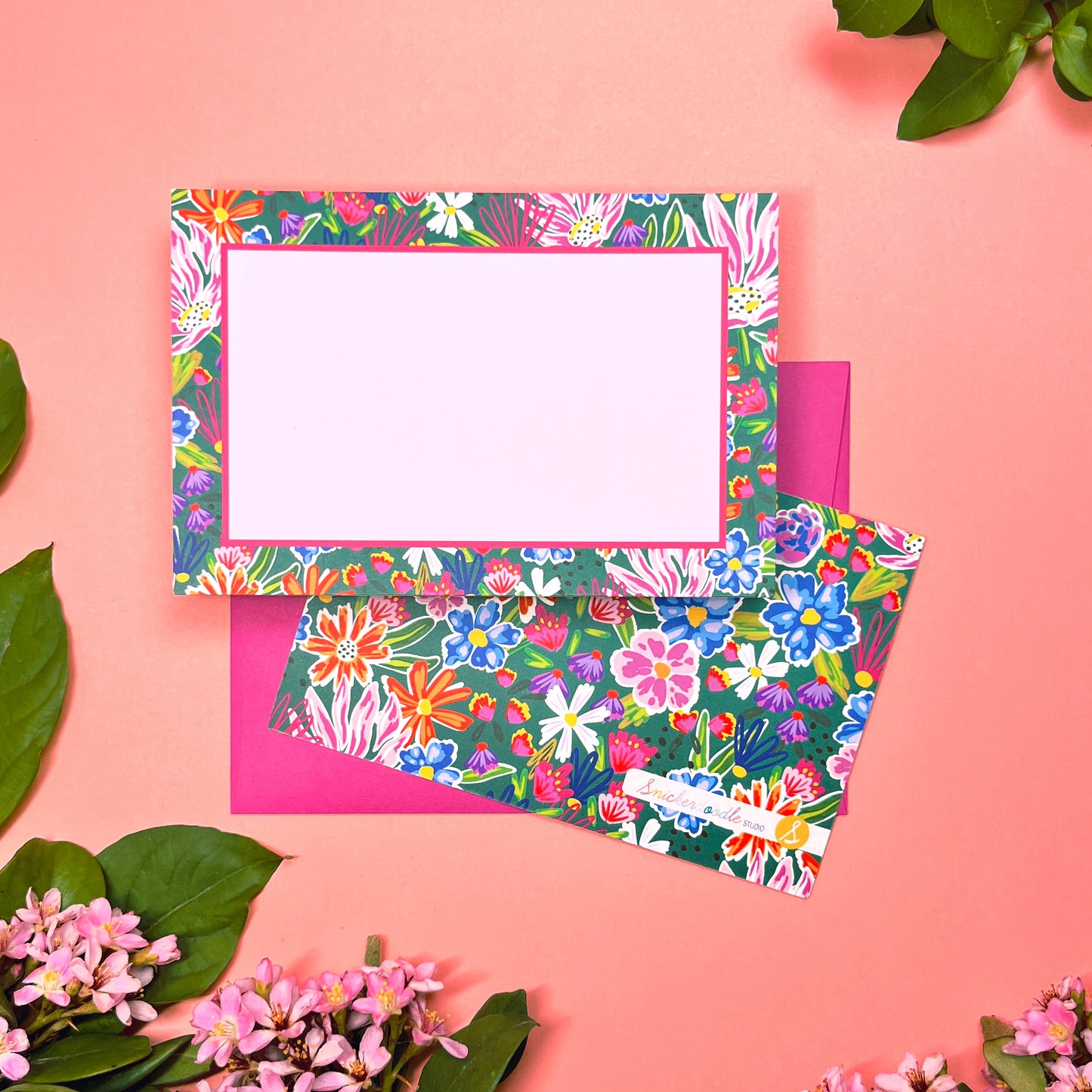 Bright floral on dark green background pattern, printed front and back, for the cutest flat note cards for handwritten greeting. Stationery set of 10 with envelopes. Shown with magenta envelope.