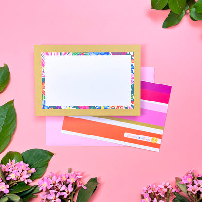 Bright floral pattern in a retro olive- lime border flat note card with a bright stripped back. Perfect for a warm and fu way to send a correspondence.Shown on a blush pink envelope.