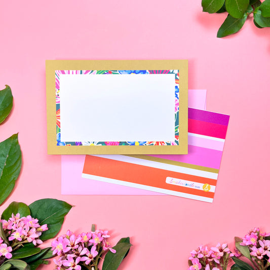 Bright floral pattern in a retro olive- lime border flat note card with a bright stripped back. Perfect for a warm and fu way to send a correspondence.Shown on a blush pink envelope.