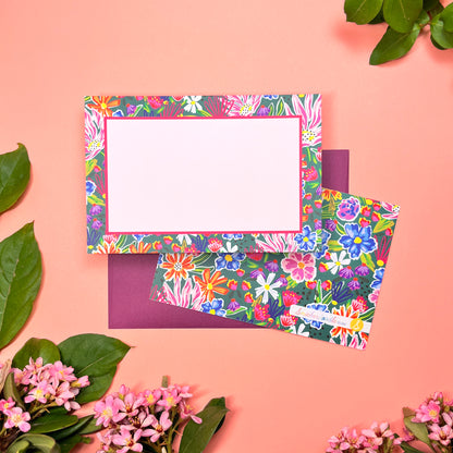 Bright floral on dark green background pattern, printed front and back, for the cutest flat note cards for handwritten greeting. Stationery set of 10 with envelopes. Shown with deep purple colored envelope.