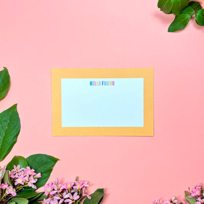 Cute yellow pebble spotted frame greeting card set of 10. Say "HELLO FRIEND" in a rainbow macaroon pastel way. Front of card shown by itself.